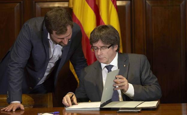 Antoni Comín junto a Carles Puigdemont./Efe