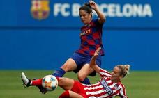 Un lance de un choque de la Liga Iberdrola entre el Barcelona y el Atlético./efe