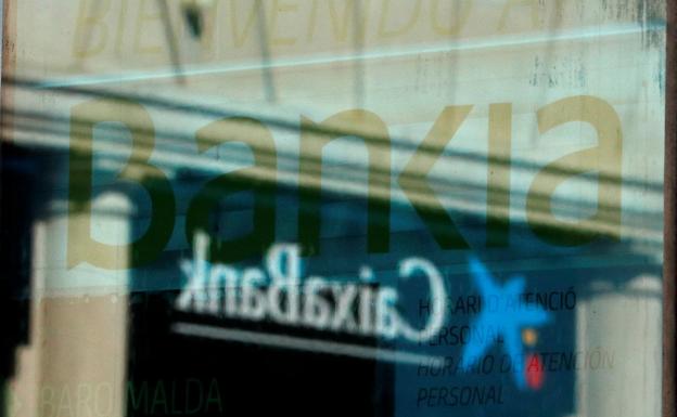 Bankia y Caixabank convocan para el jueves sus consejos de administración para aprobar la fusión